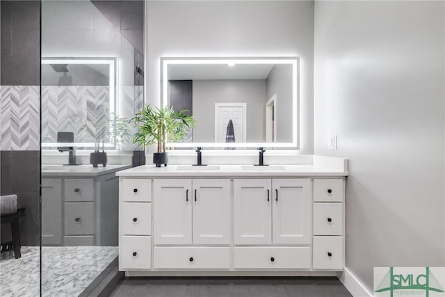 bathroom featuring vanity and walk in shower