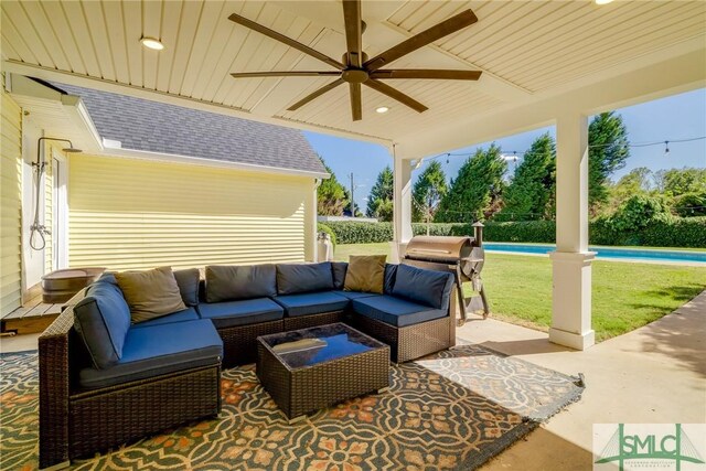 view of patio / terrace featuring an outdoor living space and ceiling fan