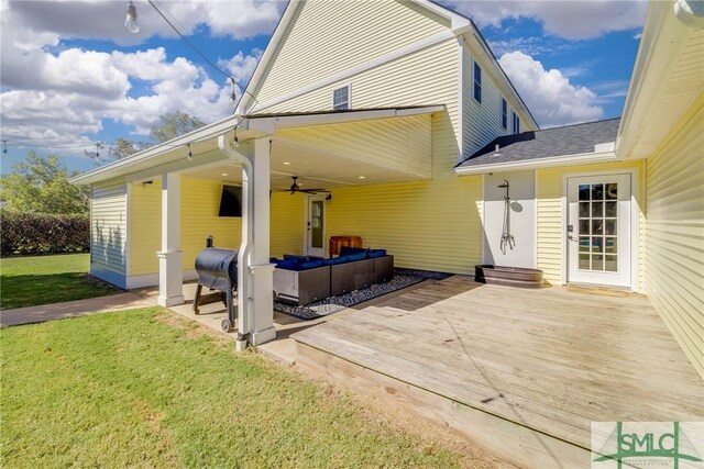 rear view of property with a yard