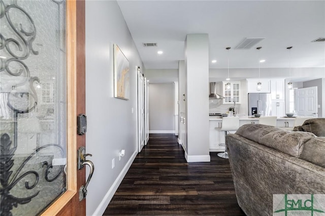 interior space with dark hardwood / wood-style floors