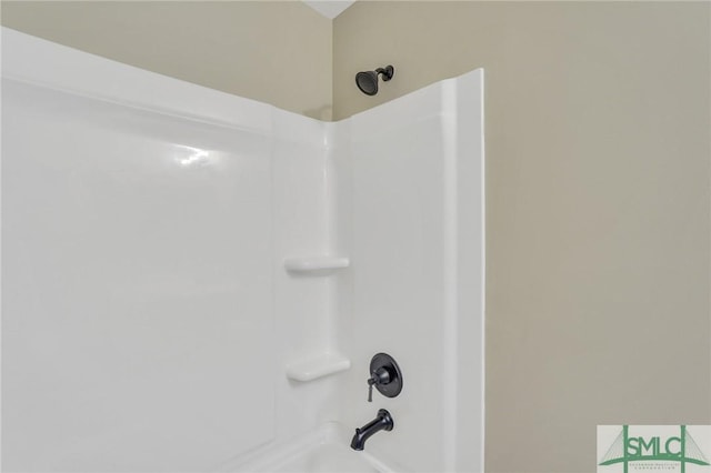 room details with shower / washtub combination