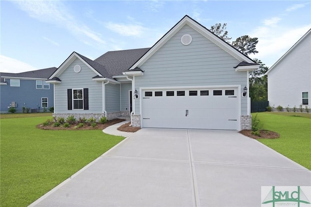 129 Hanover Pl, Richmond Hill, GA 31324 - ranch-style house featuring a garage, a front yard, and driveway