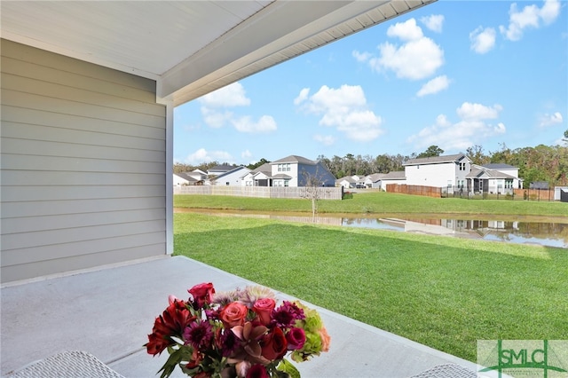 view of yard with a water view