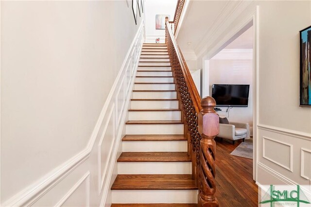 stairway featuring hardwood / wood-style flooring