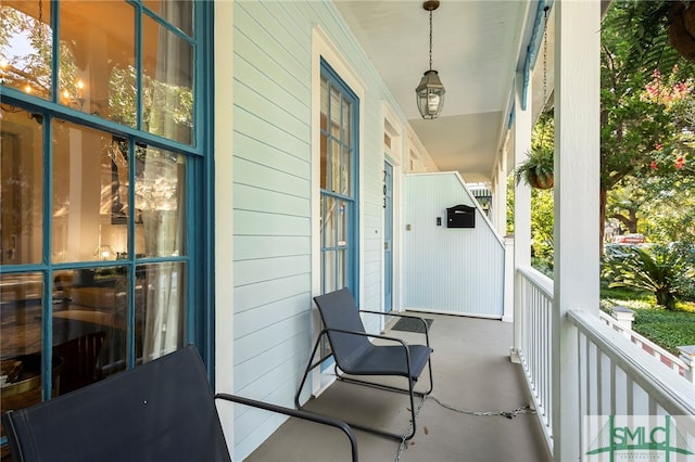 balcony featuring a porch