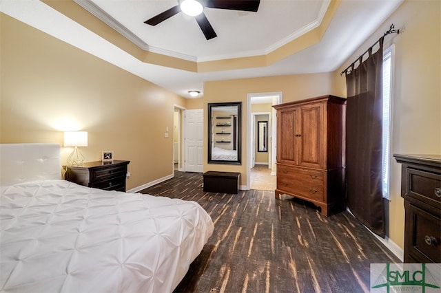 bedroom with ceiling fan, dark hardwood / wood-style flooring, and ornamental molding