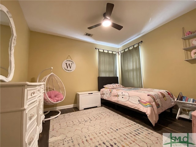 bedroom featuring ceiling fan and wood-type flooring