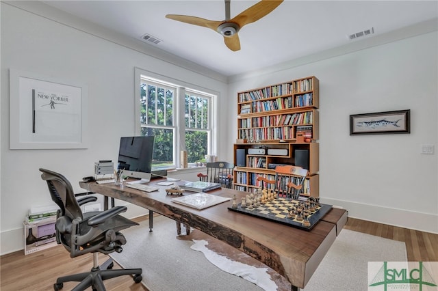 office area with hardwood / wood-style floors and ceiling fan