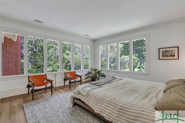 bedroom featuring hardwood / wood-style floors