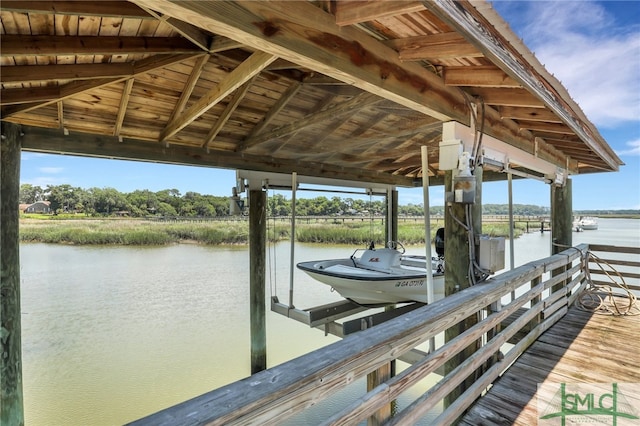 view of dock with a water view