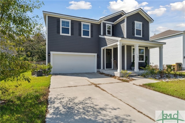 view of front of property with a garage and a porch