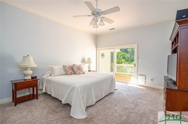 carpeted bedroom with ceiling fan, access to outside, and ornamental molding