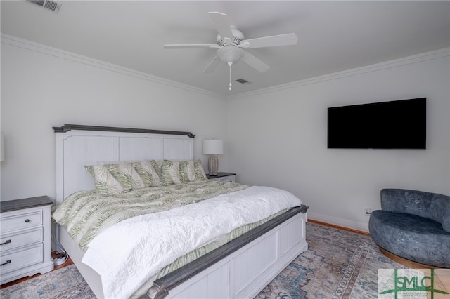 bedroom featuring ornamental molding, hardwood / wood-style floors, and ceiling fan