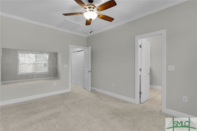 unfurnished bedroom featuring crown molding, light carpet, a closet, and ceiling fan