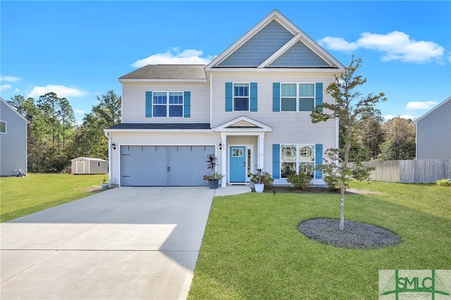 view of front of home featuring a front lawn and a garage