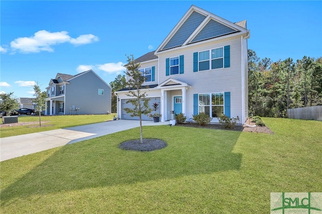 view of front facade with a front yard and a garage