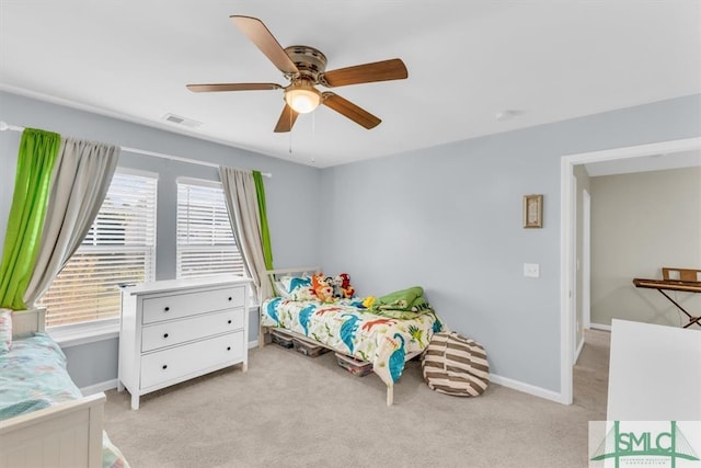 carpeted bedroom with ceiling fan