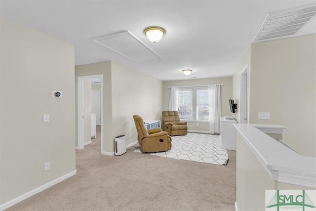 sitting room with light colored carpet