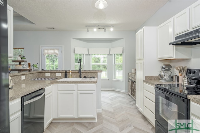 kitchen with kitchen peninsula, white cabinets, black range with electric stovetop, and a textured ceiling