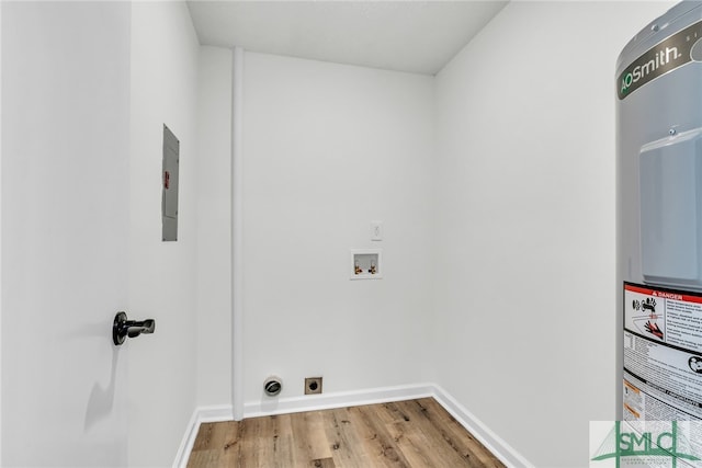 laundry room featuring hookup for an electric dryer, hardwood / wood-style floors, water heater, and washer hookup