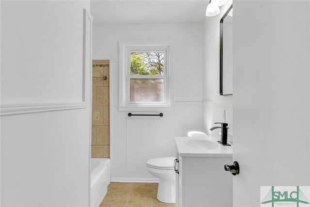 full bathroom featuring vanity, bathing tub / shower combination, toilet, and tile patterned flooring