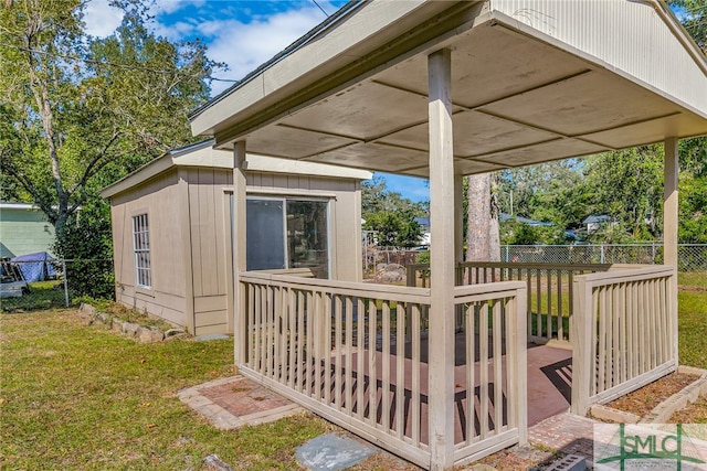 deck featuring a yard