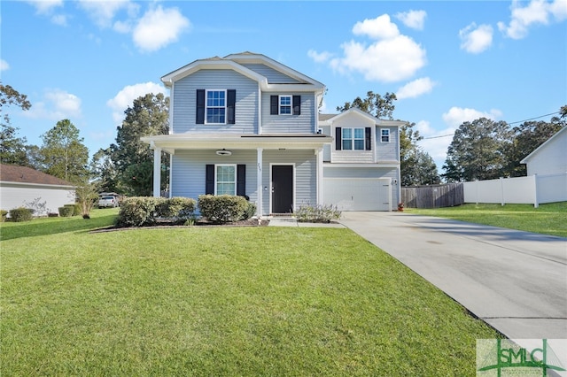 view of front of home featuring a garage, a front lawn, and a porch