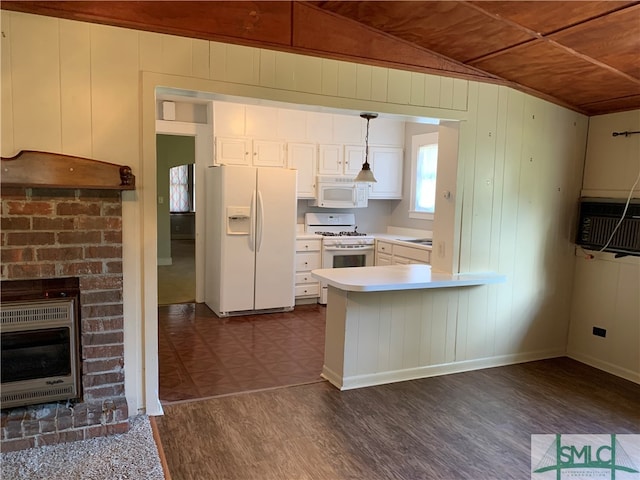 kitchen with white cabinetry, dark hardwood / wood-style flooring, vaulted ceiling, decorative light fixtures, and white appliances