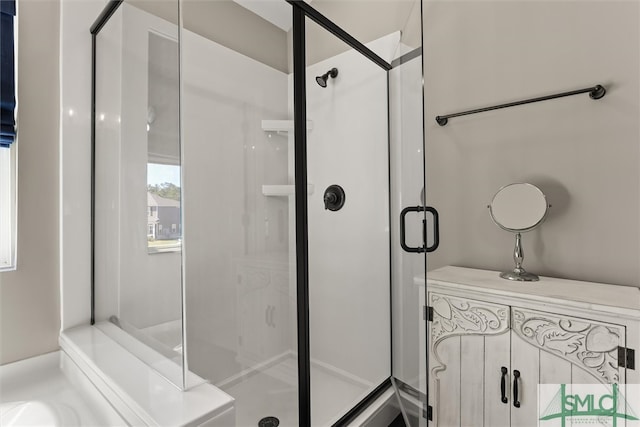 bathroom with an enclosed shower