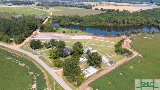 aerial view with a water view and a rural view