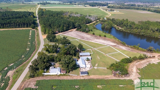 aerial view featuring a rural view and a water view