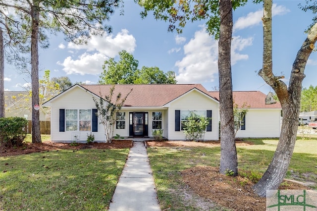 ranch-style house with a front yard