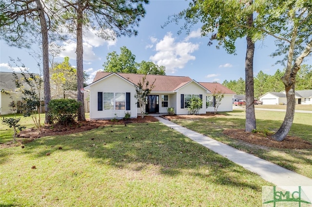 ranch-style home with a front yard