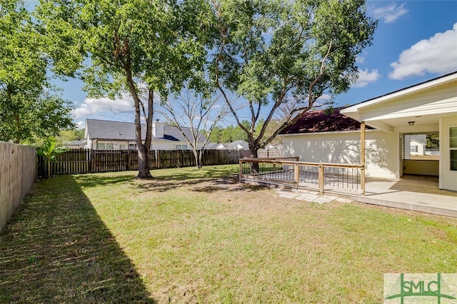 view of yard featuring a wooden deck