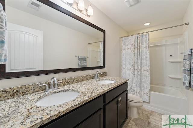 full bathroom with toilet, shower / bath combo, and vanity