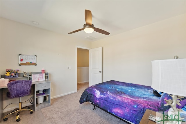 bedroom featuring light carpet and ceiling fan