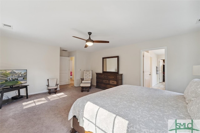 bedroom with ceiling fan and light carpet