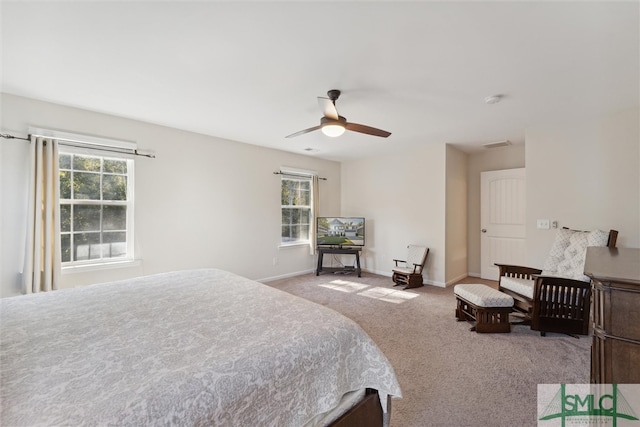 carpeted bedroom featuring ceiling fan