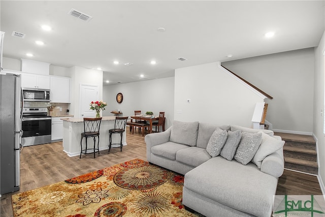 living room featuring light wood-type flooring