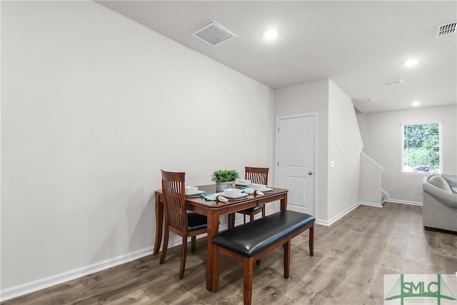 dining room with light hardwood / wood-style flooring