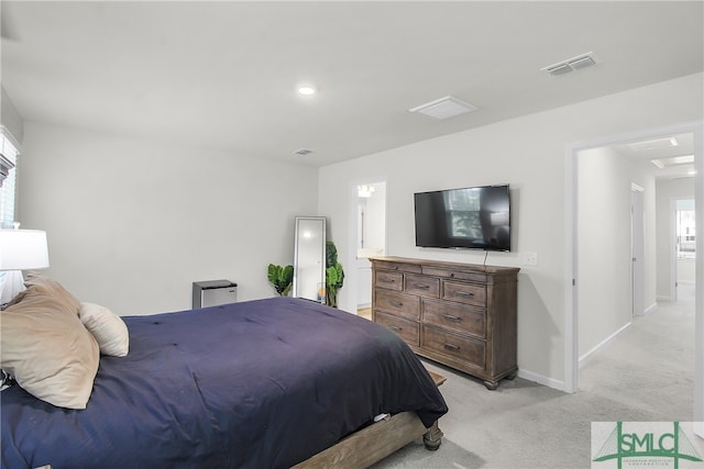 bedroom with light carpet