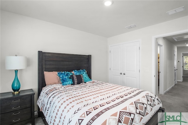 bedroom featuring a closet and carpet flooring