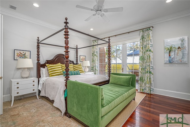 bedroom with ceiling fan, ornamental molding, and wood-type flooring