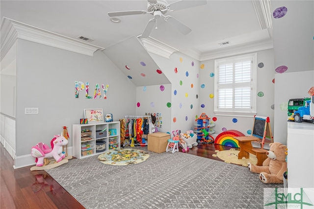 playroom featuring ceiling fan, wood-type flooring, and ornamental molding