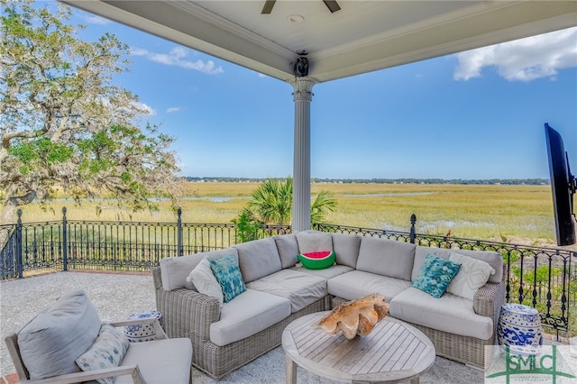 view of patio with ceiling fan and an outdoor hangout area