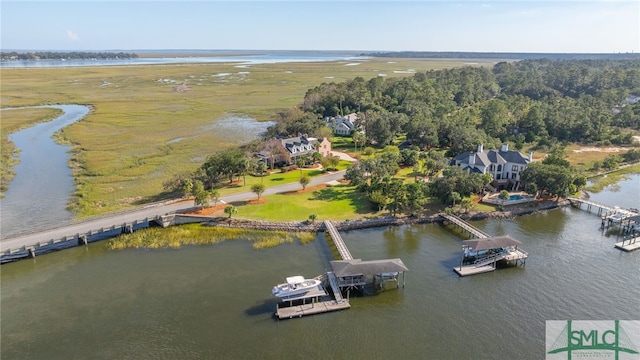 bird's eye view with a water view