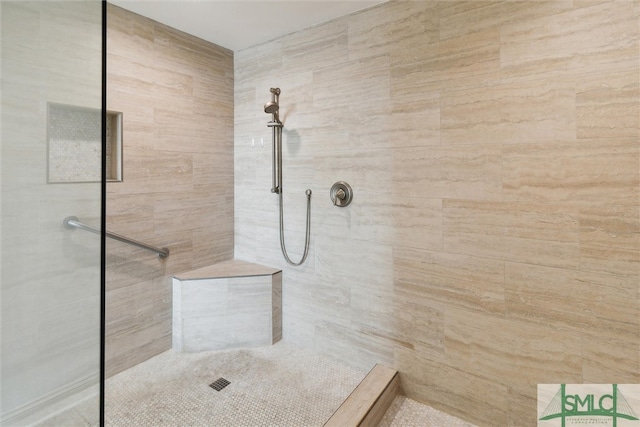 bathroom featuring walk in shower