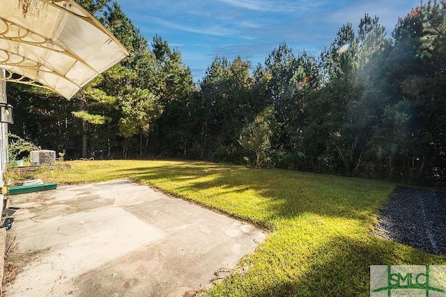 view of yard with a patio area