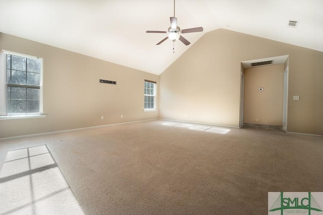 unfurnished room featuring carpet floors, high vaulted ceiling, visible vents, and a ceiling fan