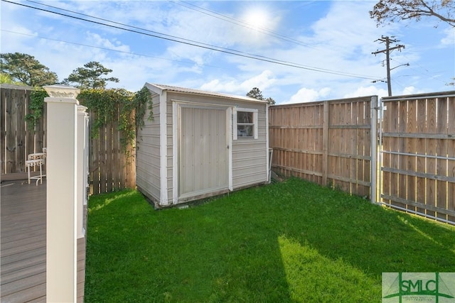 view of shed featuring a fenced backyard